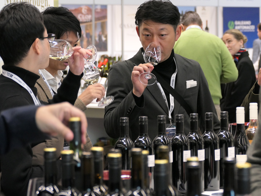 Wine professionals sampling wines at the World Bulk Wine Exhibition.