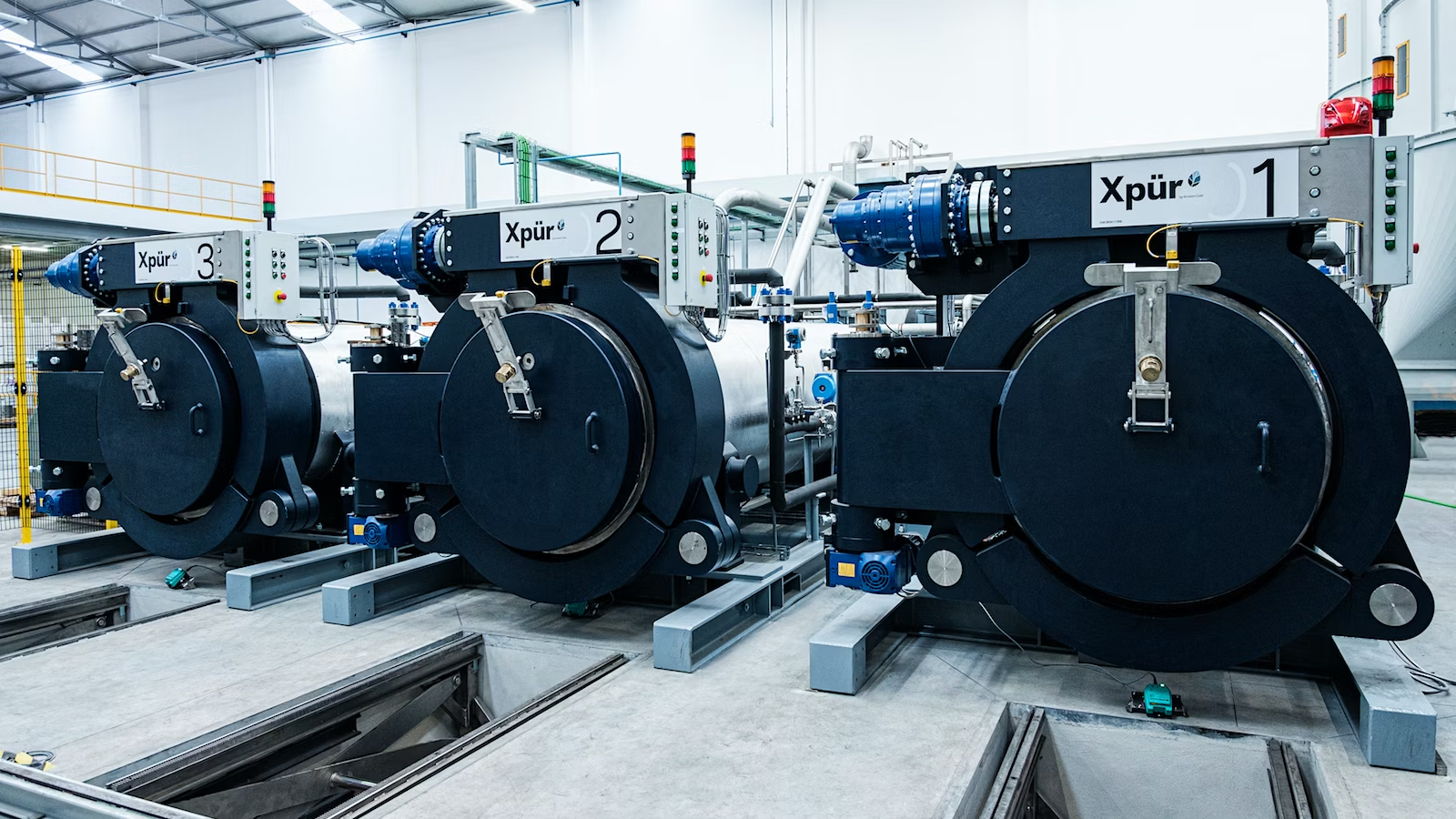 A row of machines used in manufacturing the Amorim XPur closures.