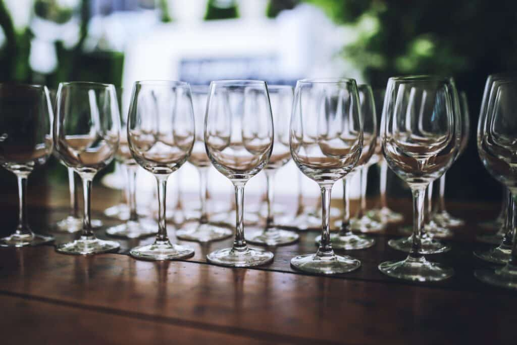 Empty wine glasses on a wooden table